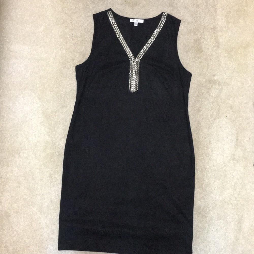 Ultra suede dress with silver/ rhinestone detail.